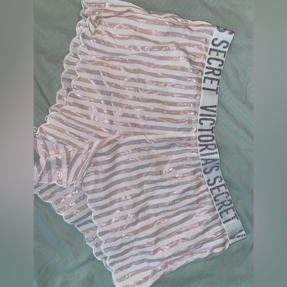 Victoria’s Secret shorts. White and sparkly pink.